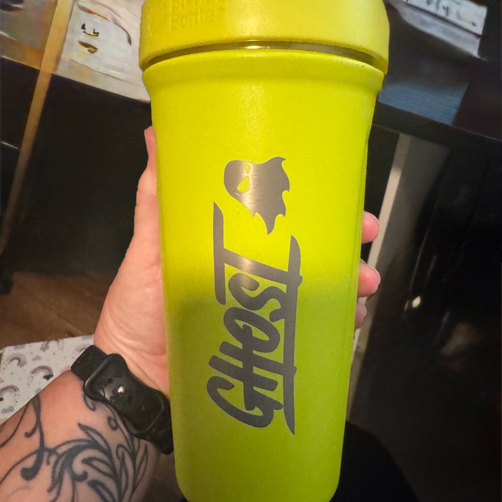 Set of  9 shaker cups. One is stainless)Different companies